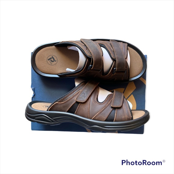 NWT AND IN THE BOX PROPET VERO LEATHER SLIDES. SIZE 14